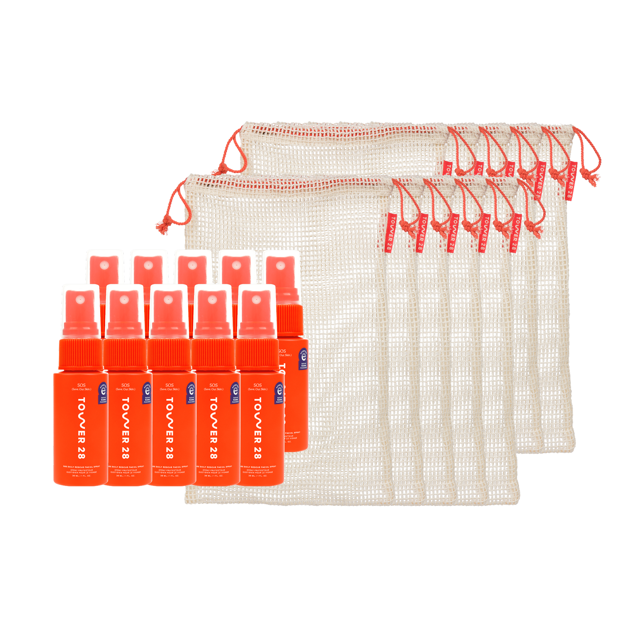 Set of orange spray bottles with a mesh bag on a white background [Shared]
