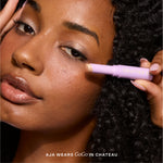 [Close-up of a woman applying GoGo Eyeshadow. Studio 28 + Chateau]