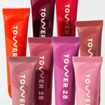 [Family group photo of the Tower 28 Beauty LipSoftie® Lip Treatments on white background]