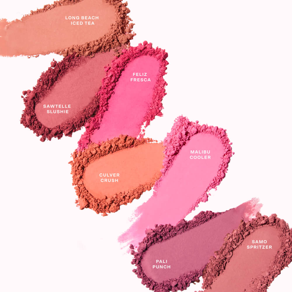 Crushed swatches of all seven Tower 28 Beauty GetSet Powder Blush shades are shown, labeled from top to bottom: Long Beach Iced Tea, Sawtelle Slushie, Feliz Fresca, Culver Crush, Malibu Cooler, Pali Punch, and Samo Spritzer. [Shared]