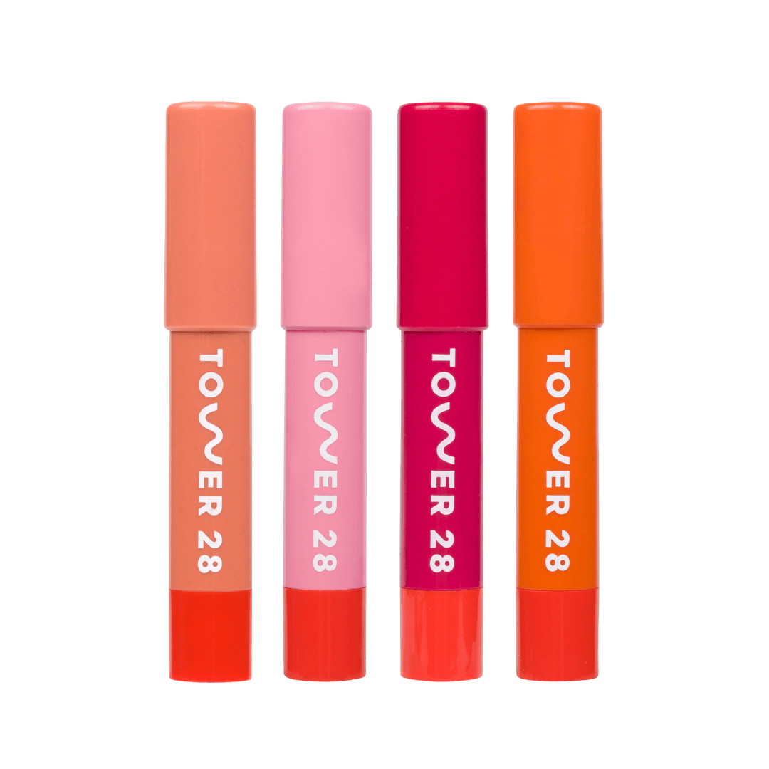 Shared: A close up of all four shades in Tower 28 Beauty's JuiceBalm Set: Drink, Shake, Mix, and Squeeze.