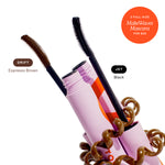 Makeup brushes with pink holder on a white background [MakeWaves® Mascara Duo]