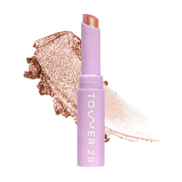 Eyeshadow with glittery texture and 'Tower 28' branding on a white background [Avalon]