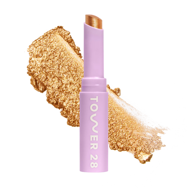 Eyeshadow with glittery texture and 'Tower 28' branding on a white background [Bungalow]