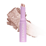 Eyeshadow with glittery texture and 'Tower 28' branding on a white background [Roxy]