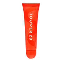 The Tower 28 Beauty LipSoftie™ Lip Treatment in the shade SOS Vanilla. [SOS Vanilla]