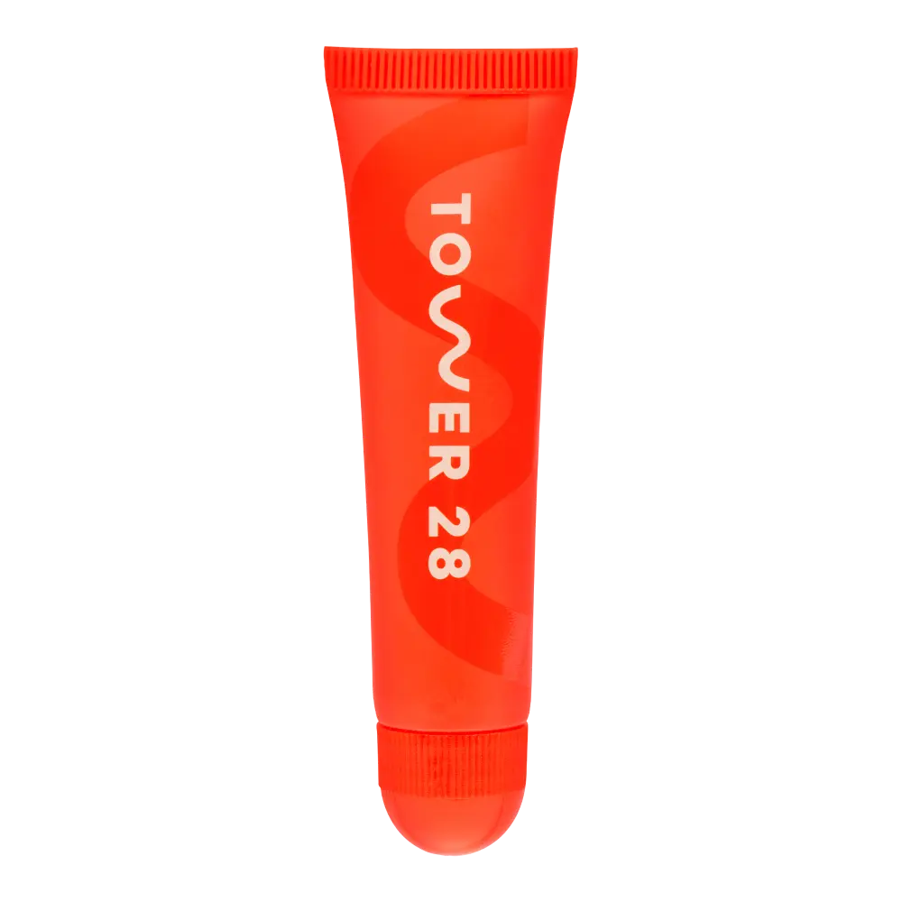 The Tower 28 Beauty LipSoftie™ Lip Treatment in the shade SOS Vanilla. [SOS Vanilla]