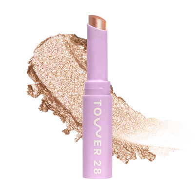 Eyeshadow with glittery texture and 'Tower 28' branding on a white background [Troubadour]