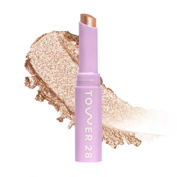 Eyeshadow with glittery texture and 'Tower 28' branding on a white background [Troubadour]