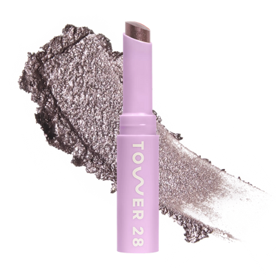 Eyeshadow with glittery texture and 'Tower 28' branding on a white background [Viper]