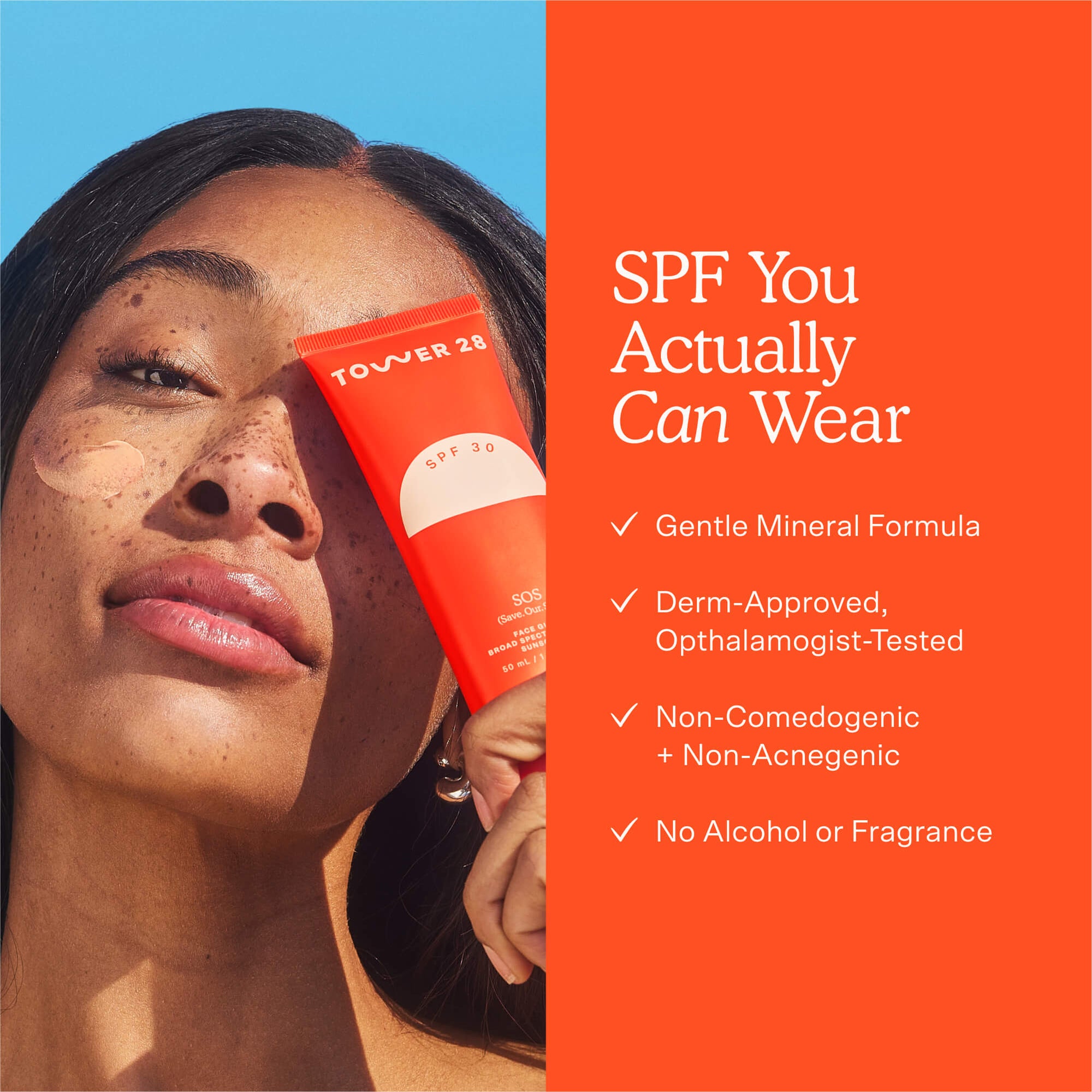 A person holds up a bottle of Tower 28 Beauty 's SOS FaceGuard SPF 30 while wearing swatches of the product on their cheek. Text highlights features including a gentle mineral formula, no alcohol or fragrance, and dermatologist approval.  [Shared: SOS FaceGuard SPF 30]