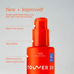 Red bottle with pump labeled 'Tower 28' on a gray background [Shared]