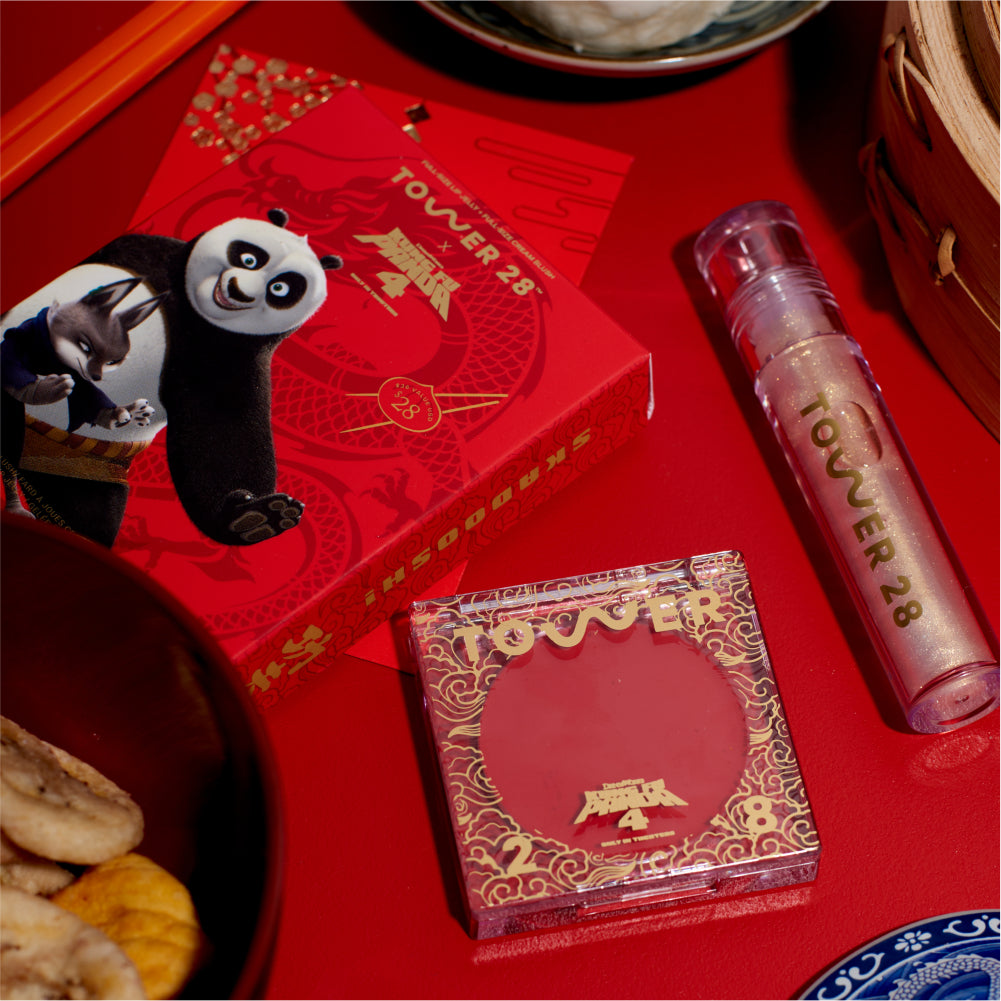 [Shared: Table flat lay of Tower 28 Beauty x Kung Fu Panda 4 limited edition collaboration: Lip + Cheek Duo. It features one full size ShineOn Lip Jelly in Magic and one full size BeachPlease Cream Blush in Dumpling Hour.]