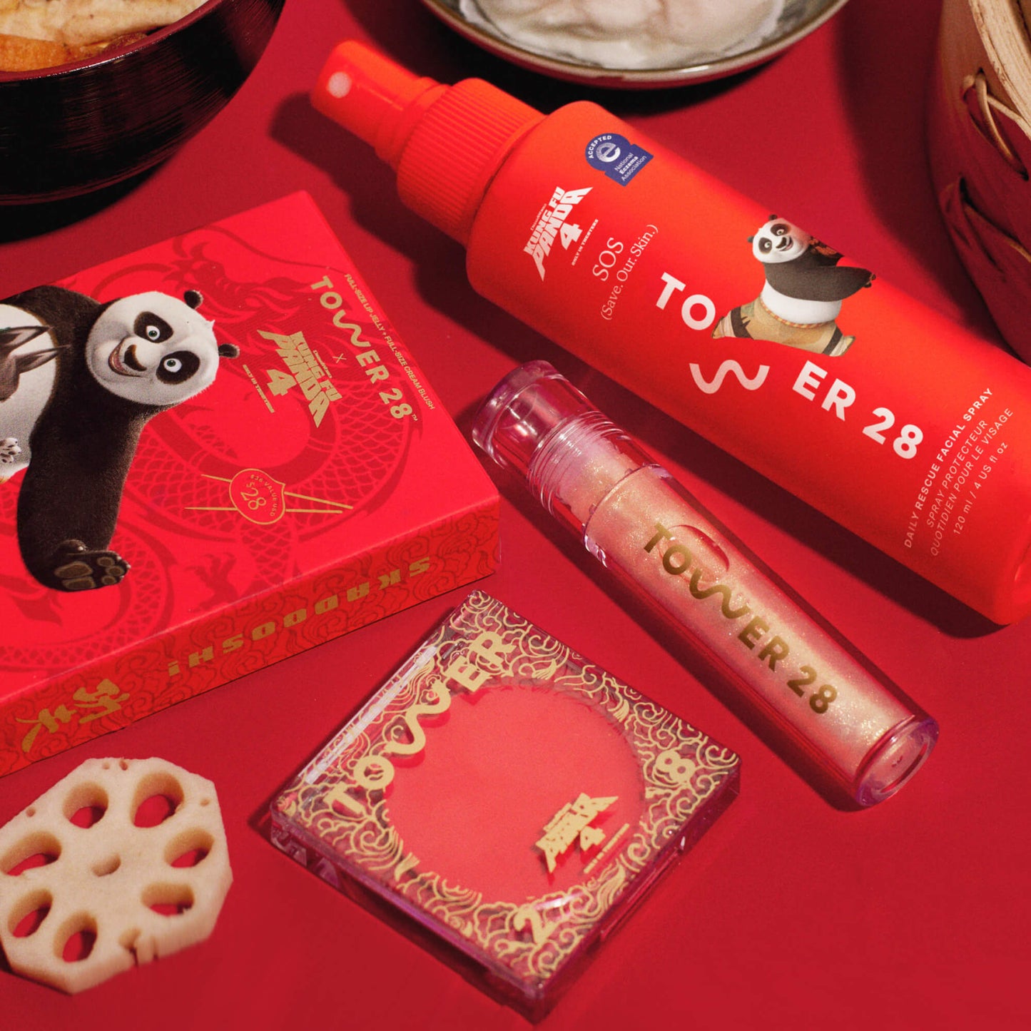 Tower 28 x Kung Fu Panda 4 Collection [Shared: Table flat lay of Tower 28 Beauty x Kung Fu Panda 4 limited edition collaboration collection: Lip + Cheek Duo and SOS Daily Rescue Facial Spray. The Lip + Cheek Duo features one full size ShineOn Lip Jelly in Magic and one full size BeachPlease Cream Blush in Dumpling Hour.]