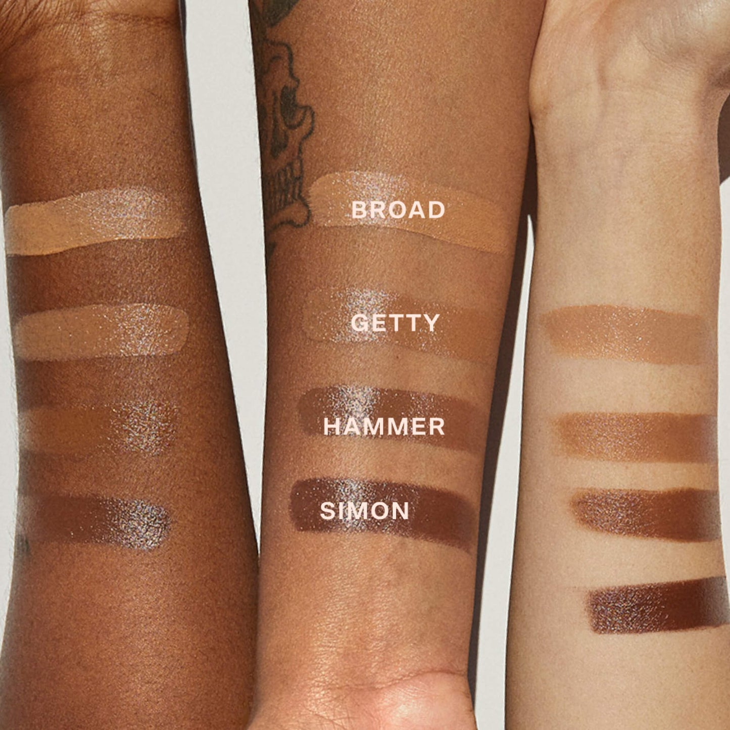 [Shared: All four shades of the Tower 28 Beauty Sculptino™ Cream Contour swatched on three different skin tones]