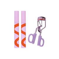 Two tubes of Tower 28 Beauty’s MakeWaves Mascara in the shades Jet and Drift are shown next to the MakeWaves Eyelash Curler. [MakeWaves Mascara Set]