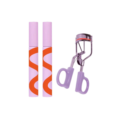 Two tubes of Tower 28 Beauty’s MakeWaves Mascara in the shades Jet and Drift are shown next to the MakeWaves Eyelash Curler. [MakeWaves Mascara Set]