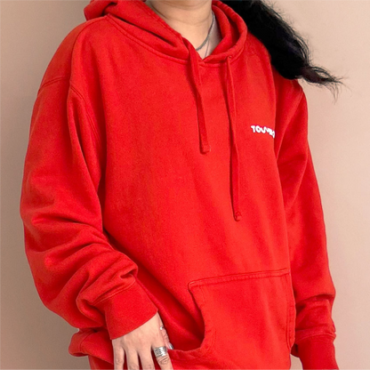 Christina wears a Medium. [Shared: Tower 28 Beauty's SOS Hoodie in sunset orange where all proceeds are donated to Heal The Bay.]