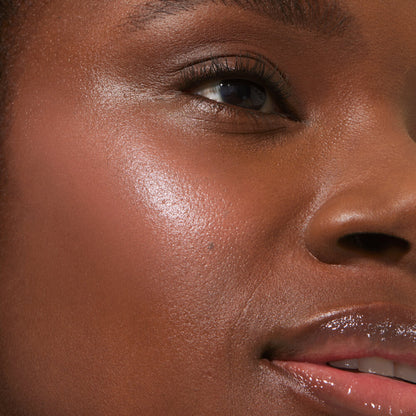 Magic Hour [A close up of a model with Tower 28 Beauty's BeachPlease Cream Blush in Magic Hour on her face.]