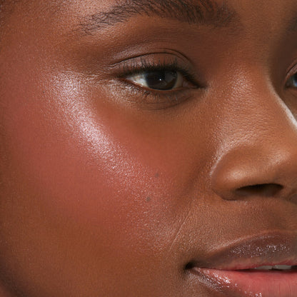Office Hours [A close up of a model with Tower 28 Beauty's BeachPlease Cream Blush in Office Hours on her face.]