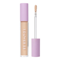 Tower 28 Beauty Swipe Serum Concealer in the shade 6.0 IE, shown with the tube standing upright next to the open applicator wand to reveal the product. [6.0 IE]