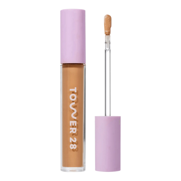 Tower 28 Beauty Swipe Serum Concealer in the shade 12.0 PALI, shown with the tube standing upright next to the open applicator wand to reveal the product. [12.0 PALI]