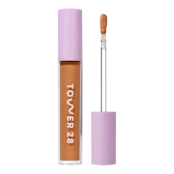 Tower 28 Beauty Swipe Serum Concealer in the shade 14.0 PV, shown with the tube standing upright next to the open applicator wand to reveal the product. [14.0 PV]