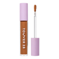 Tower 28 Beauty Swipe Serum Concealer in the shade 15.0 SAMO, shown with the tube standing upright next to the open applicator wand to reveal the product. [15.0 SAMO]