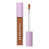 Tower 28 Beauty Swipe Serum Concealer in the shade 16.0 SB, shown with the tube standing upright next to the open applicator wand to reveal the product. [16.0 SB]