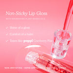 Lip gloss with a glass of poppi Cranberry Fizz on a pink background [Shared]