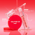 Tower 28 poppi lip jelly and blush on a red background [Shared]
