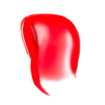 A swatch of Tower 28 Beauty LipSoftie™ Lip Treatment in Blood Orange Vanilla on a white background. [Blood Orange Vanilla]
