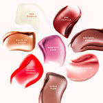 [Shared: Image displaying swatches of all LipSoftie shades, applied in smooth, glossy strokes on skin or a neutral background. Each swatch shows the distinct color and finish of the product, ranging from sheer tints to more pigmented hues. The visual highlights the variety of flavors and shades available in the LipSoftie collection.]