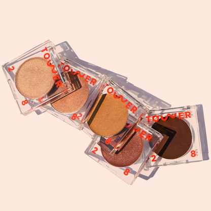 Bronzino™ Cream Bronzer available in five shades. [Shared: Close up of Tower 28 Beauty's five Bronzino™ Cream Bronzer shades]