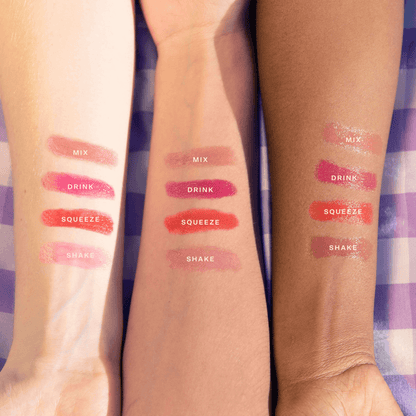 [Shared: All four shades of Tower 28 Beauty's JuiceBalm Lip Balm swatched on three different skin tones]