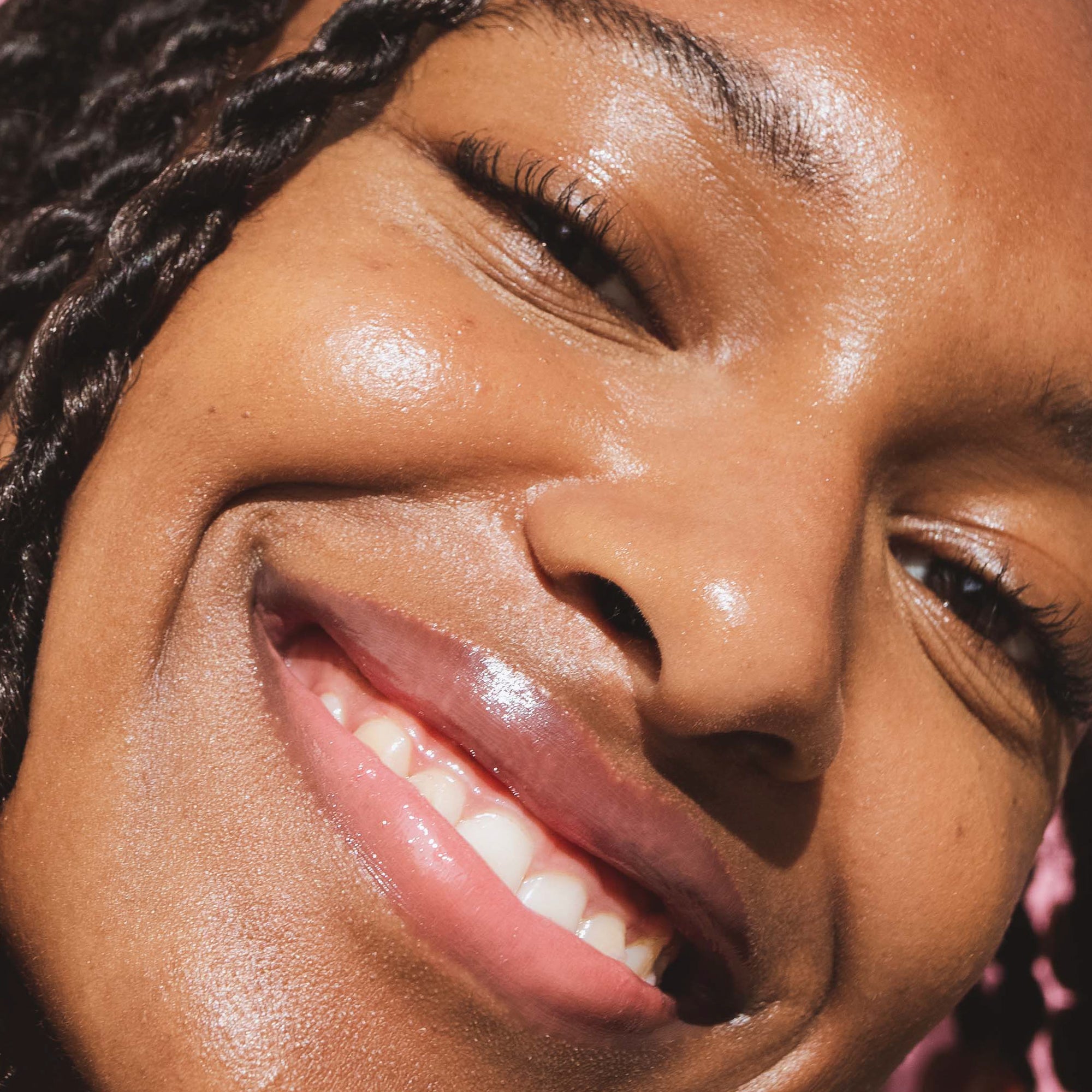 A model wearing the Tower 28 Beauty ShineOn Lip Jelly in the shade Pistachio on her lips. [Pistachio]