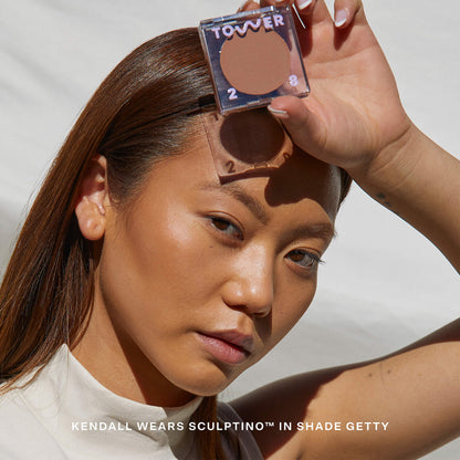 Shade: Getty [A model wearing the Tower 28 Beauty Sculptino™ Cream Contour in the shade Getty]