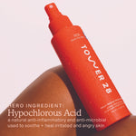 Tower 28 Beauty SOS Daily Rescue Spray 4oz, highlighting hypochlorous acid as a key soothing and anti-inflammatory ingredient. [SOS Rescue Spray 4oz]